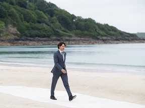 Oh hey, it's Canada's prime minister on a white sandy beach.