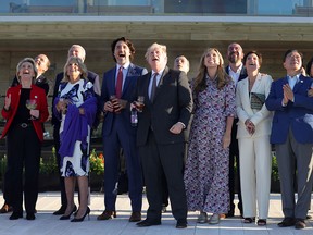 Prime Minister Justin Trudeau joins other G7 leaders as they watch a performance by the RAF Red Arrows aerobatic team in Cornwall on June 12, 2021.