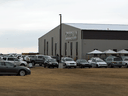 Cars parked outside Gracelife Church near Edmonton on March 28, 2021 after Pastor James Coates returned from spending 33 days in jail for disobeying COVID public health orders.