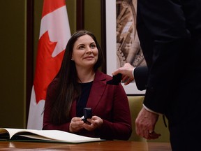 Jenica Atwin is presented with her Member of Parliament pin as she is sworn in as an MP and a member of the Green party caucus on Nov. 26, 2019. The MP, who has been highly critical of Israel, and who clashed with Green leader Annamie Paul over the Israel-Hamas conflict, has now left the Greens and joined the Liberal party.