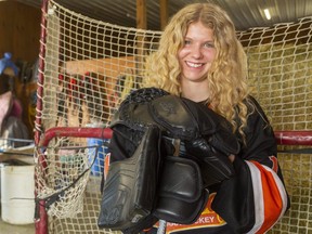 Taya Currie, a goaltender with the AAA U16 Elgin-Middlesex Chiefs, has a chance next month to become the first female player chosen in an Ontario Hockey League draft. She was photographed in her family's barn in Parkhill on Sunday May 2, 2021. Mike Hensen/The London Free Press/Postmedia Network