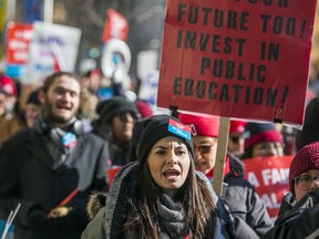Ontario teachers and education workers picket outside of  The Fairmont Royal York Hotel in Toronto, Ont. on Wednesday February 12, 2020.