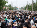 People attend a vigil for five members of a Muslim family who police say were victims of a deadly vehicle attack in London, Ont., June 8, 2021.