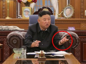 Kim Jong Un, wearing his IWC Schaffhausen Portofino wrist watch, presides at a meeting with senior officials from the Workers' Party of Korea Central Committee and Provincial Party Committees in Pyongyang, North Korea, in this undated photo released on June 8, 2021.