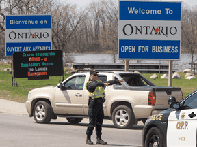 Ontario Provincial Police check travellers entering Ontario from Quebec as new COVID-19 measures take effect Monday, April 19, 2021  in Hawkesbury, Ontario.