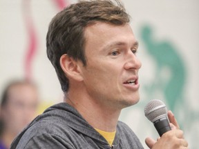 Canadian Olympian Simon Whitfield spoke about his experience as an athlete at a special assembly for the 300 students at Mother Teresa Catholic School on Thursday October 2, 2014.