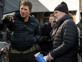 Director Chris McKay (at right) on the set of The Tomorrow War.