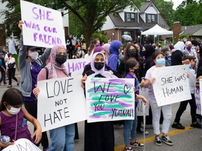 Members of the Muslim community and supporters gather for a vigil at the London Muslim Mosque on June 8, 2021 in London, Canada.