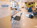 People sit in a cooling centre to beat the heat amid record high temperatures in Vancouver.