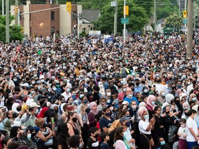 Members of the Muslim community and supporters gather for a vigil at the London Muslim Mosque on June 8, 2021 in London, Canada.