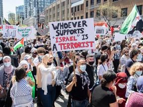 People attend a demonstration  in Montreal on May 15, to denounce Israel's military actions in the Palestinian territories.