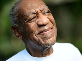 Bill Cosby smiles outside his home in Elkins Park, Pennsylvania, on June 30, 2021, after Pennsylvania's highest court overturned his sexual assault conviction and ordered him released from prison immediately.