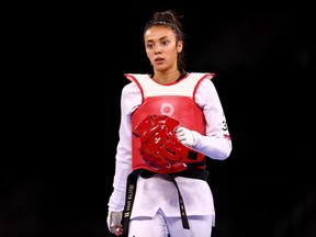 Skylar Park of Team Canada reacts after being defeated by Lo Chia-ling of Team Chinese Taipei during the Women's -57kg Taekwondo Quarterfinal contest on day two of the Tokyo 2020 Olympic Games at Makuhari Messe Hall on July 25, 2021 in Chiba, Japan. (Photo by Maja Hitij/Getty Images)