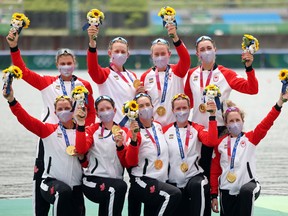 Gold medalists Lisa Roman, Kasia Gruchalla-Wesierski, Christine Roper, Andrea Proske, Susanne Grainger, Madison Mailey, Sydney Payne, Avalon Wasteneys and Kristen Kit of Team Canada pose with their medals during the medal ceremony for the Women's Eight Final A on day seven of the Tokyo 2020 Olympic Games at Sea Forest Waterway on July 30, 2021 in Tokyo, Japan.
