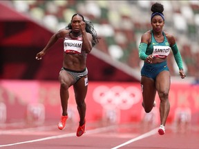 Khamica Bingham of Team Canada and Rosangela Santos of Team Brazil competes in the Women's 100 metres heats on day seven of the Tokyo 2020 Olympic Games at Olympic Stadium on July 30, 2021 in Tokyo, Japan.