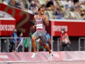 Andre De Grasse of Team Canada, competes in the Men's 100m Round 1 heats.