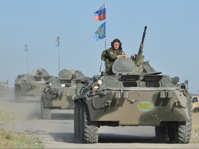 Russian soldiers of Rapid Deployment Forces of the Central Asian nations take part on August 1, 2014 in joint military exercises.