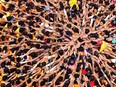 Indian Hindu devotees gesture before attempting to form a human pyramid for the Janmashtami festival in Mumbai on August 18, 2014.