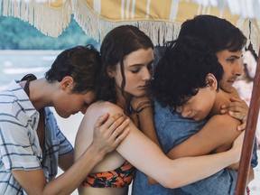 From left, Vicky Krieps, Thomasin McKenzie, Alex Wolff and Guy Garcia Bernal in Old.