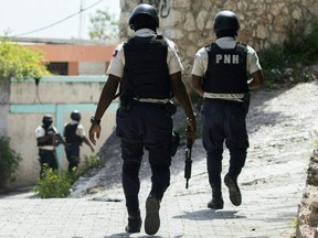 Police patrol outside the Embassy of Taiwan in Port-au-Prince, Haiti on July 9.