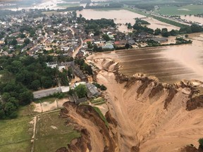 The death toll from devastating floods in Europe soared to at least 126 on July 16, most in western Germany where emergency responders were frantically searching for missing people.