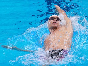 Russia's Evgeny Rylov competes in the final of the men's 200m backstroke swimming event during the Tokyo 2020 Olympic Games.