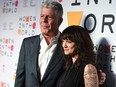 Anthony Bourdain and Italian actress Asia Argento attend the 2018 Women In The World Summit at Lincoln Center in New York City on April 13, 2018.