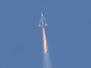 The Virgin Galactic SpaceShipTwo space plane Unity and mothership separate as they fly Richard Branson toward space, above Spaceport America in New Mexico on July 11, 2021.