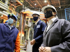 Prime Minister Justin Trudeau tours the Algoma Steel plant in Sault Ste. Marie, Ont. on July 5, 2021.