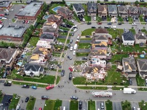 An aerial view shows damage to buildings in a suburb in the aftermath of a tornado in Barrie, Ontario.