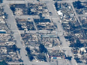 Buildings, destroyed by a wildfire on June 30, are left behind in Lytton, British Columbia.