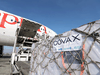 Ethiopian Airlines staff unload AstraZeneca COVID-19 vaccine doses under the COVAX scheme from a cargo plane at Bole International Airport in Addis Ababa, Ethiopia.