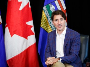 Prime Minister Justin Trudeau speaks as he meets with Alberta Premier Jason Kenney in Calgary on Wednesday, July 7.