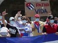 Cuban residents gather to protest against the Cuban government after recent demonstrations erupted in Cuba, in Santo Domingo