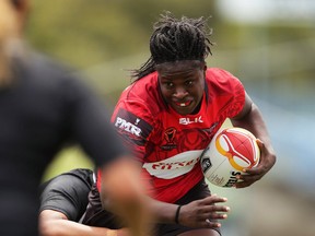 Natasha Smith of Canada takes on the defence during the 2017 Women's Rugby League World Cup match between New Zealand and Canada at Southern Cross Group Stadium on November 16, 2017 in Sydney, Australia.