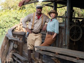 Dwayne "The Rock" Johnson and Emily "Pants" Blunt in Jungle Cruise.