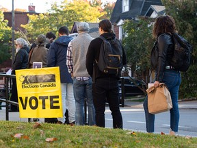 People line up to vote in Ottawa during the past federal election on Oct. 21, 2019. A Leger survey shows that the top four concerns of Canadians for the 2021 federal election are the cost of living, health-care funding, post-pandemic economic recovery, and managing the pandemic.