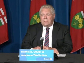 Ontario Premier Doug Ford, speaking at Queen's Park, announces a plan for a gradual reopening of the province.