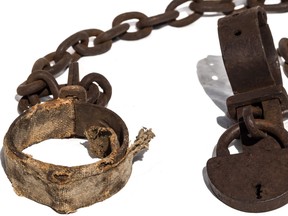 Shackles and a padlock used to lock up slaves.