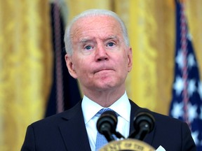U.S. President Joe Biden pauses while as he answers questions about the pace of COVID-19 vaccinations during remarks at the White House in Washington on July 29.
