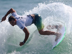 Tokyo 2020 Olympics - Surfing - Men's Shortboard - Round 1 - Tsurigasaki Surfing Beach, Tokyo, Japan - July 25, 2021. Julian Wilson of Australia in action during Heat 3
