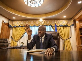 Jovenel Moise in the presidential office in 2018.