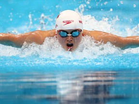 Tokyo 2020 Olympics - Swimming - Women's 100m Butterfly - Heats - Tokyo Aquatics Centre - Tokyo, Japan - July 24, 2021. Maggie Mac Neil of Canada in action.