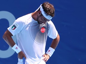 Italian tennis star Fabio Fognini blamed the searing Tokyo heat for incessant use of a homophobic slur in his Olympic men’s singles loss to Daniil Medvedev Wednesday.