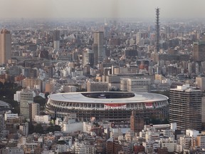 The National stadium, the main venue of the Tokyo 2020 Olympic Games, is photographed from Shibuya Sky observation deck in Tokyo, Japan, July 19, 2021.