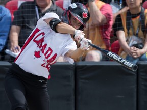 Canada's Jennifer Gilbert takes a cut against Mexico during the Softball Americas Olympic Qualifier tournament in Surrey, B.C., on Saturday August 31, 2019. THE CANADIAN PRESS/Darryl Dyck