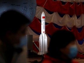 A model of the Long March-5 Y5 rocket from China's lunar exploration program Chang'e-5 Mission is displayed at an exhibition inside the National Museum in Beijing, China March 3, 2021.