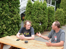 Brothers Jeff (left) and Matthew Chapman outside a motel near Lytton. The men fled the fire that destroyed much of Lytton on Wednesday evening. Their parents were killed. 