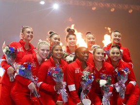 Members of the women's Olympic team and their alternates pose for a photo during the closing ceremony on the final day of women's competition in the U.S. Olympic Team Trials for gymnastics in St. Louis, Missouri, U.S., June 27, 2021.