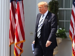 Former U.S. President Donald Trump arrives for a press conference announcing a class action lawsuit against big tech companies at the Trump National Golf Club Bedminster on July 07, 2021 in Bedminster, New Jersey.